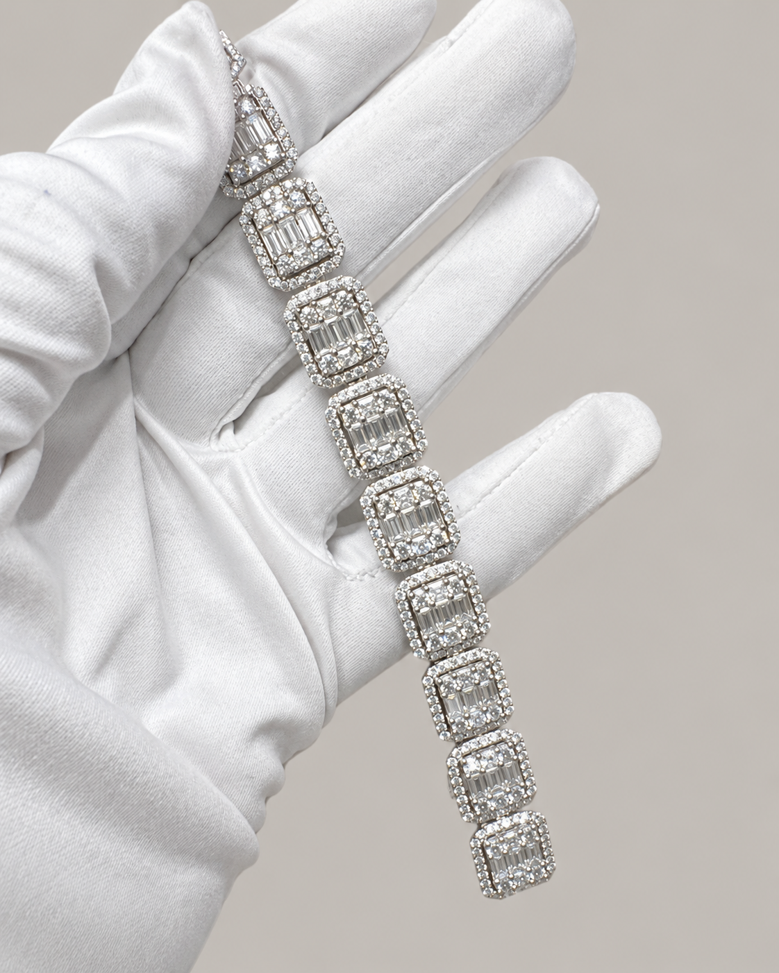 Sterling silver tennis bracelet with baguette-cut stones, featuring a hip-hop style design by Kynora Jewels.