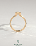 Pear cut moissanite half-bezel engagement ring in 925 silver, shown on an elegant ivory background with detailed craftsmanship.