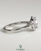 Kynora CJ 2ct round diamond claw solitaire engagement ring with halo and cathedral high setting, showcasing elegant jewelry design.
