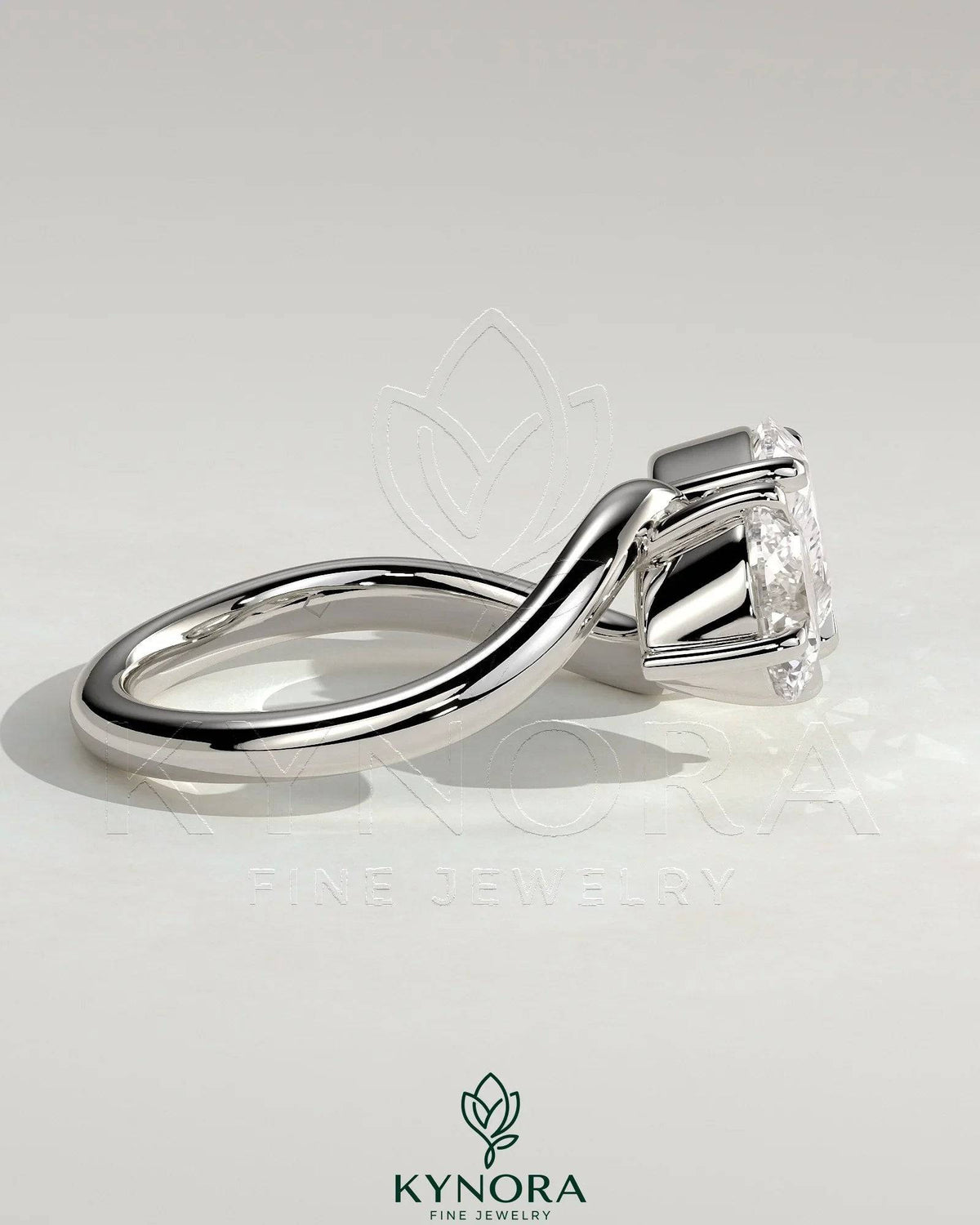 Kynora CJ 1ct round and 1.5ct pear-shaped diamond Toi et Moi engagement ring with wave band design