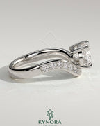 Kynora CJ 2ct oval claw solitaire engagement ring with bead-set pave wave band in east-west setting, elegant and sparkling jewelry.
