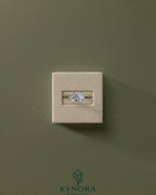 Kynora CJ Toi et Moi engagement ring featuring a 1.8ct pear-shaped and 1.5ct marquise-shaped diamonds in a claw setting.