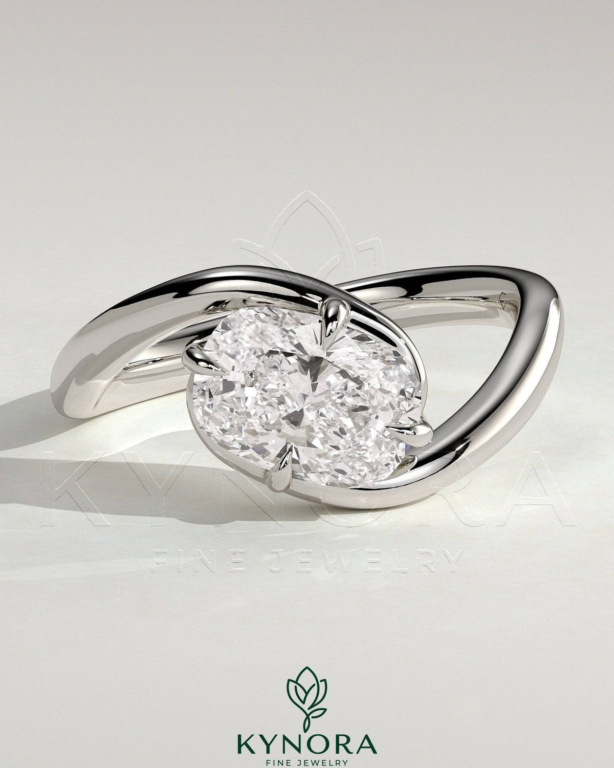 Kynora CJ 2ct elongated cushion cut diamond East-West claw solitaire engagement ring with bypass band, elegant and sparkling jewelry piece. Imagen principal del producto