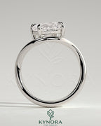 Kynora CJ 2ct elongated cushion cut diamond engagement ring with east-west setting and wave band design.