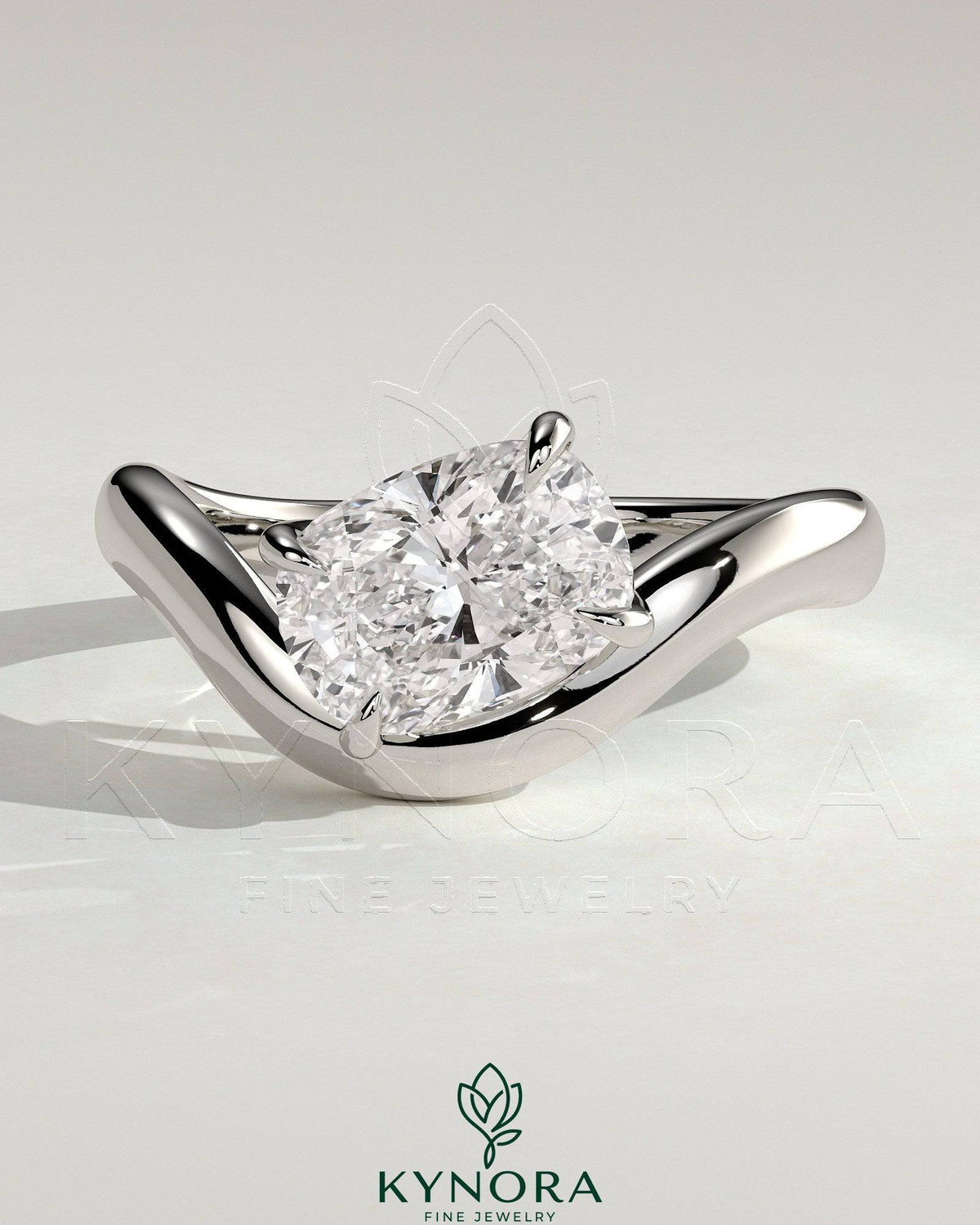 Kynora CJ 2ct elongated cushion cut diamond East-West claw engagement ring with wave band design, showcasing elegant craftsmanship.