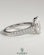 Kynora CJ Toi et Moi engagement ring with 1.5ct marquise and 1.8ct pear-shaped diamonds, pave band, cathedral setting
