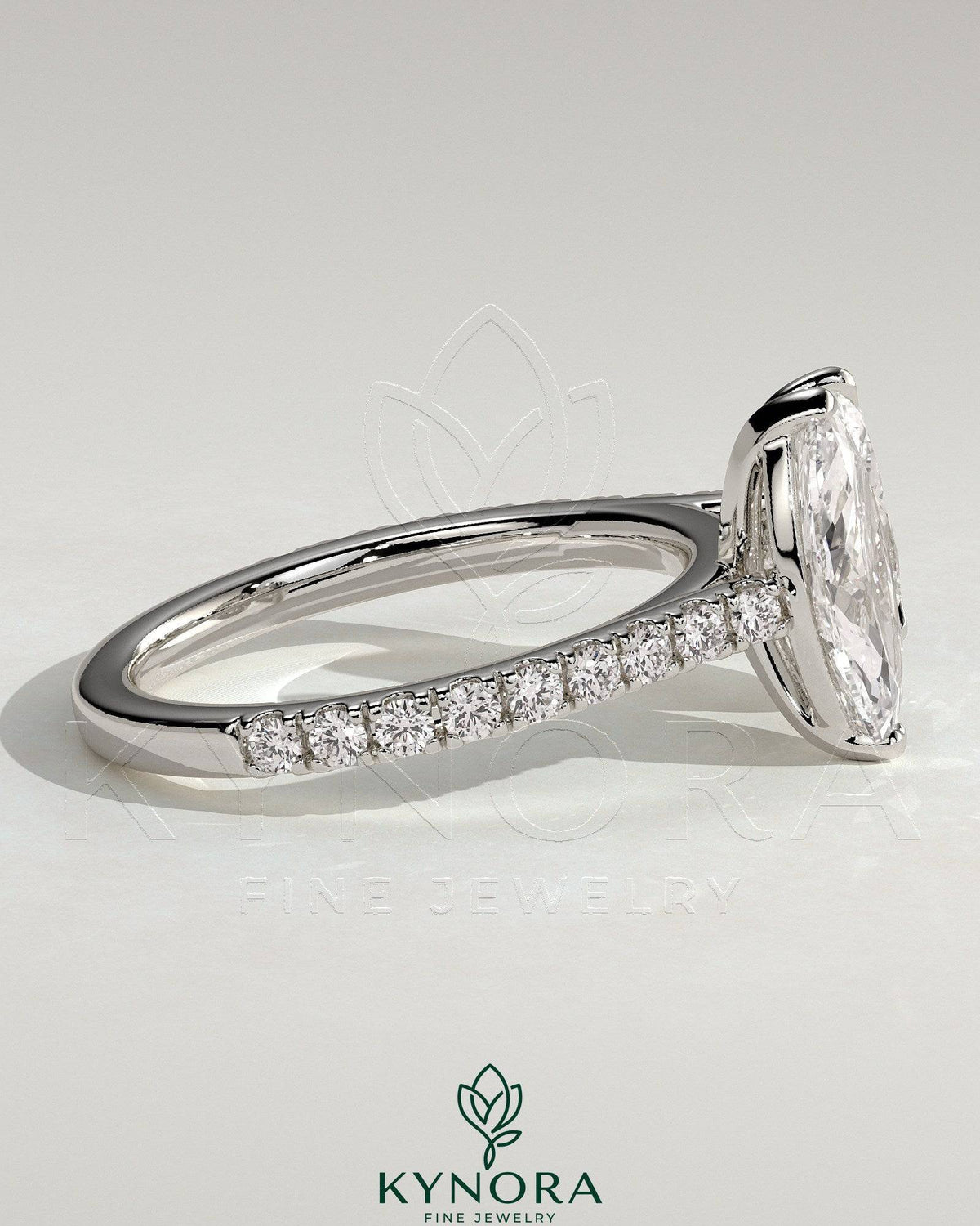 Kynora CJ Toi et Moi engagement ring with 1.5ct marquise and 1.8ct pear-shaped diamonds, pave band, cathedral setting