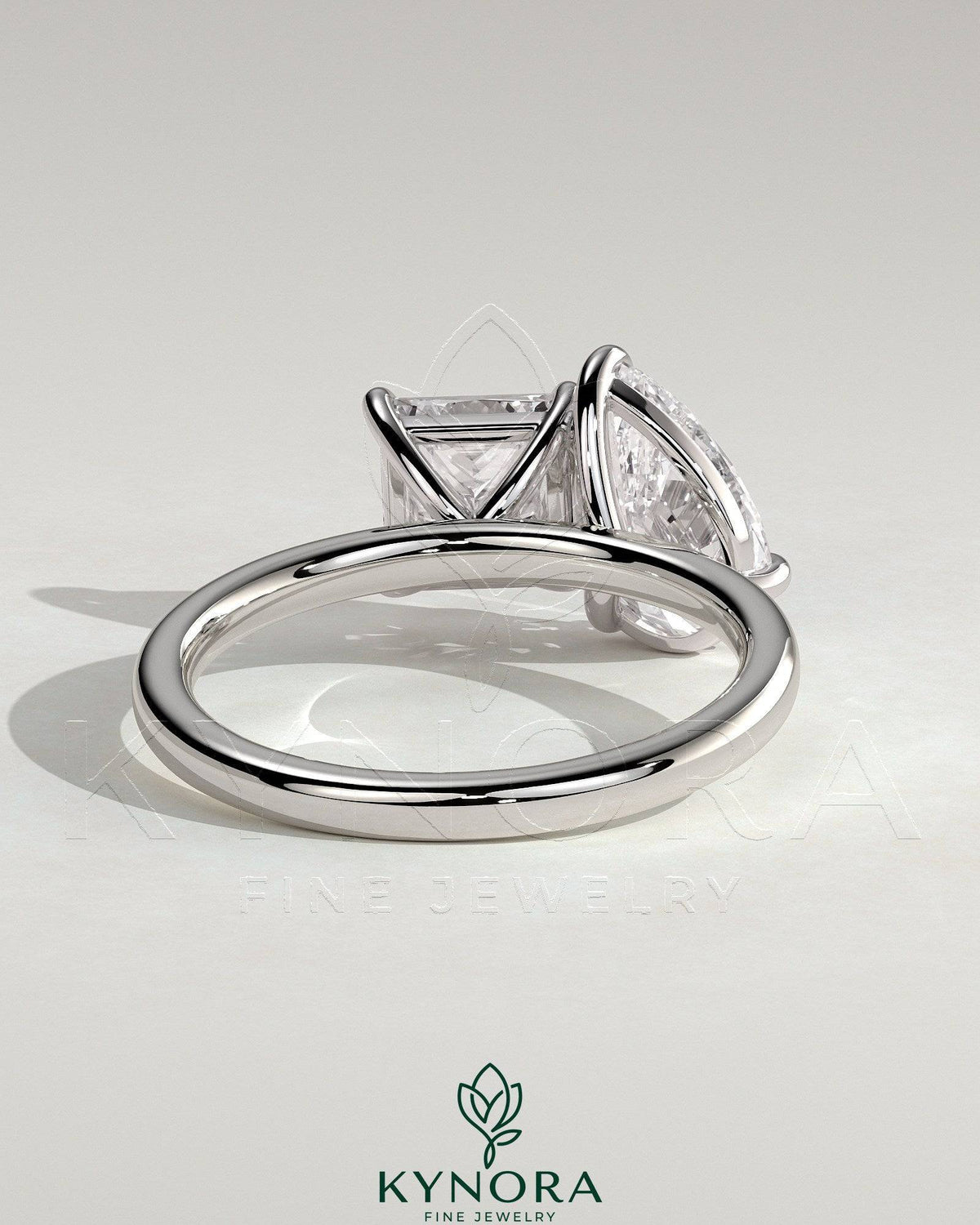 Kynora CJ Toi et Moi engagement ring with 1.65ct pear-shaped and 1.65ct princess-cut diamonds in a claw setting.