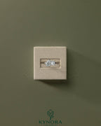 Kynora CJ Toi et Moi engagement ring with 1.65ct pear-shaped and 1.65ct princess-cut diamonds in a claw setting.