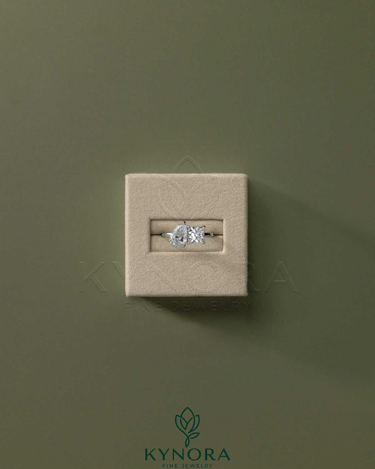 Kynora CJ Toi et Moi engagement ring with 1.65ct pear-shaped and 1.65ct princess-cut diamonds in a claw setting.