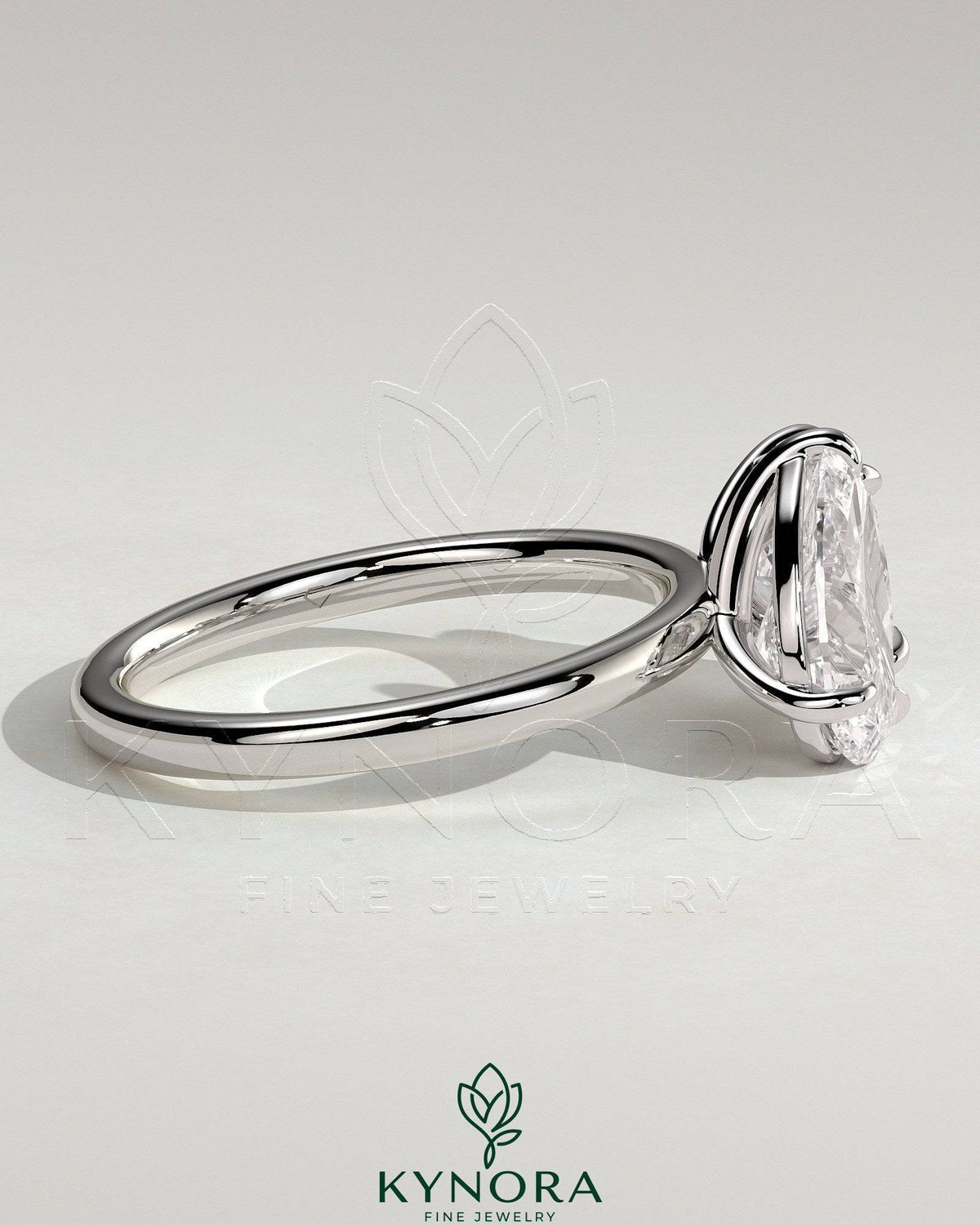 Kynora CJ Toi et Moi engagement ring with 1.65ct pear-shaped and 1.65ct princess-cut diamonds in a claw setting.