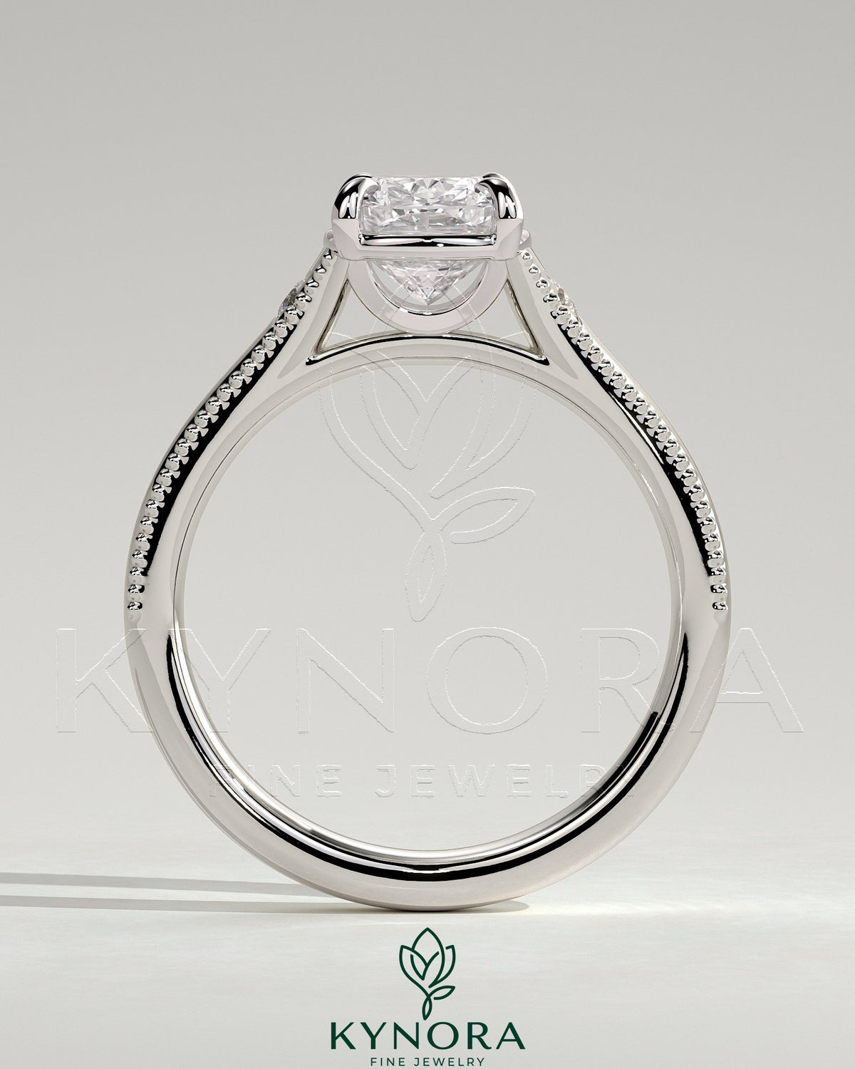 Vintage Kynora CJ 2ct elongated cushion bezel engagement ring with star accents, milgrain detailing, and tapered band.