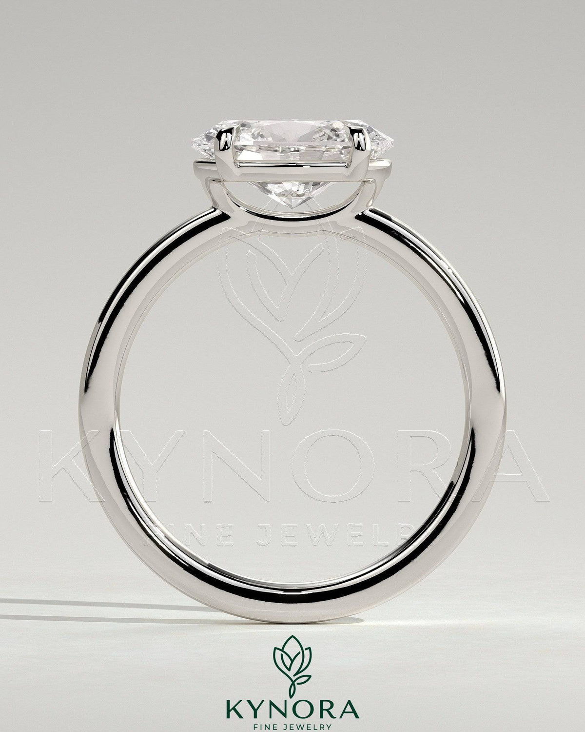 Kynora CJ 2ct oval east-west claw solitaire engagement ring with raised basket gallery showcasing elegant diamond setting.