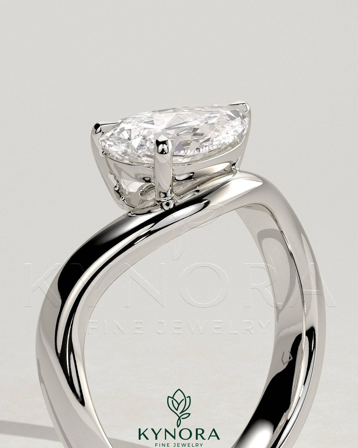 Kynora CJ 2ct pear-shaped East-West claw solitaire engagement ring with wave band, featuring a sparkling pear diamond.