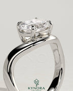 Kynora CJ 2ct oval east-west claw solitaire engagement ring with wave band, featuring a prominent oval diamond and elegant design.