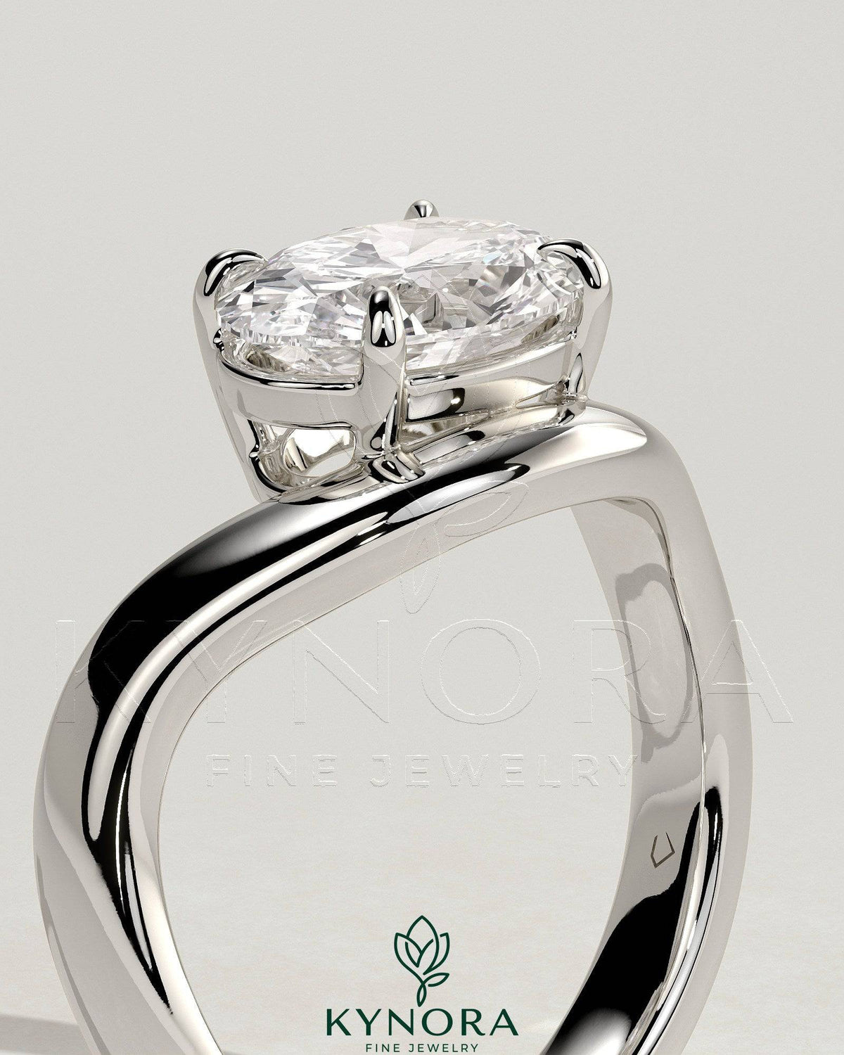 Kynora CJ 2ct oval east-west claw solitaire engagement ring with wave band, featuring a prominent oval diamond and elegant design.