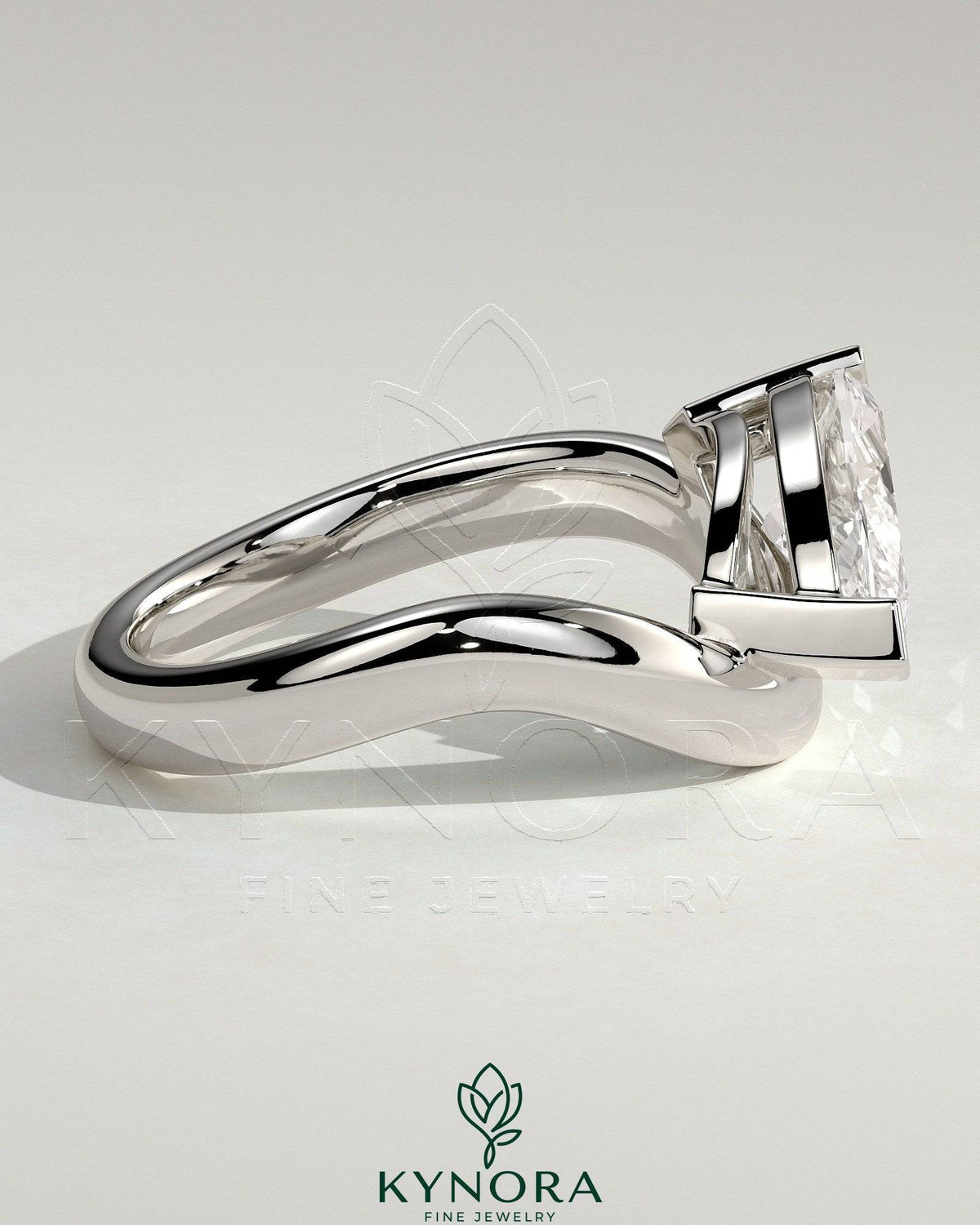 Kynora CJ 2ct marquise east-west claw solitaire engagement ring with wave band, featuring a sparkling marquise diamond.