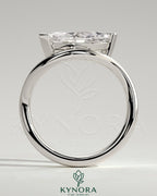 Kynora CJ 2ct marquise east-west claw solitaire engagement ring with wave band, showcasing its elegant diamond setting and band design.