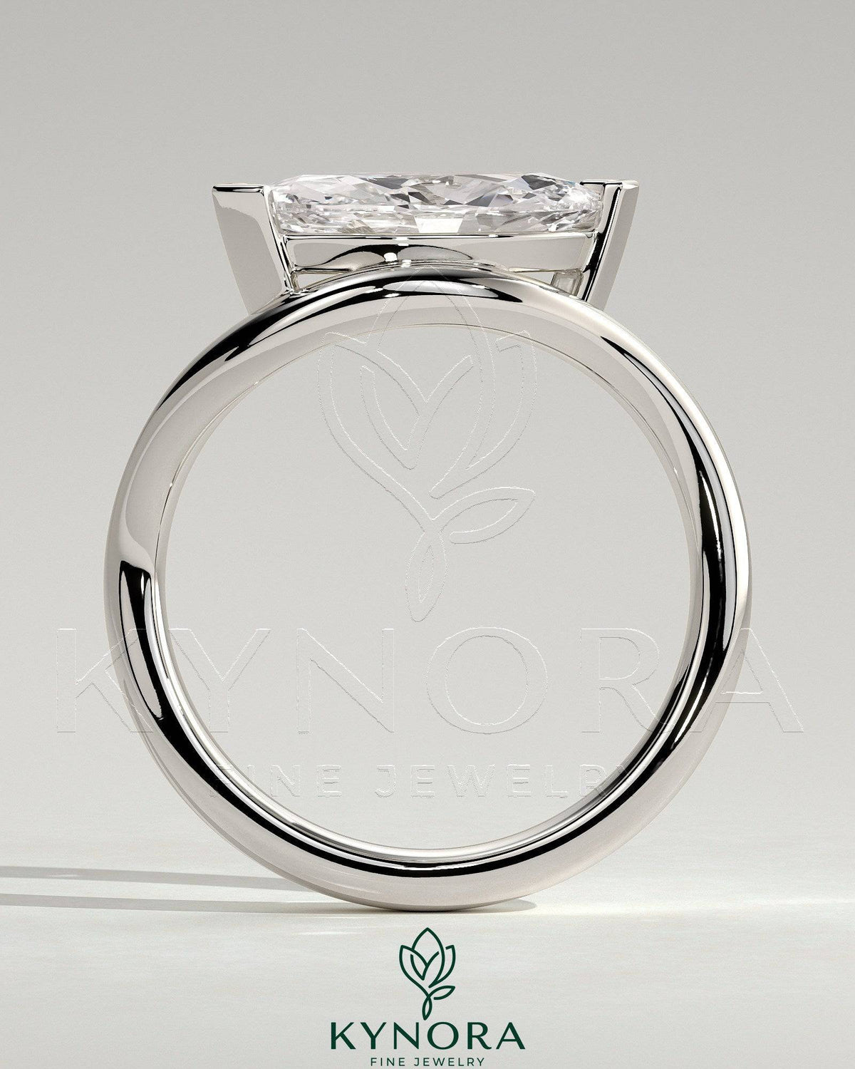 Kynora CJ 2ct marquise east-west claw solitaire engagement ring with wave band, showcasing its elegant diamond setting and band design.