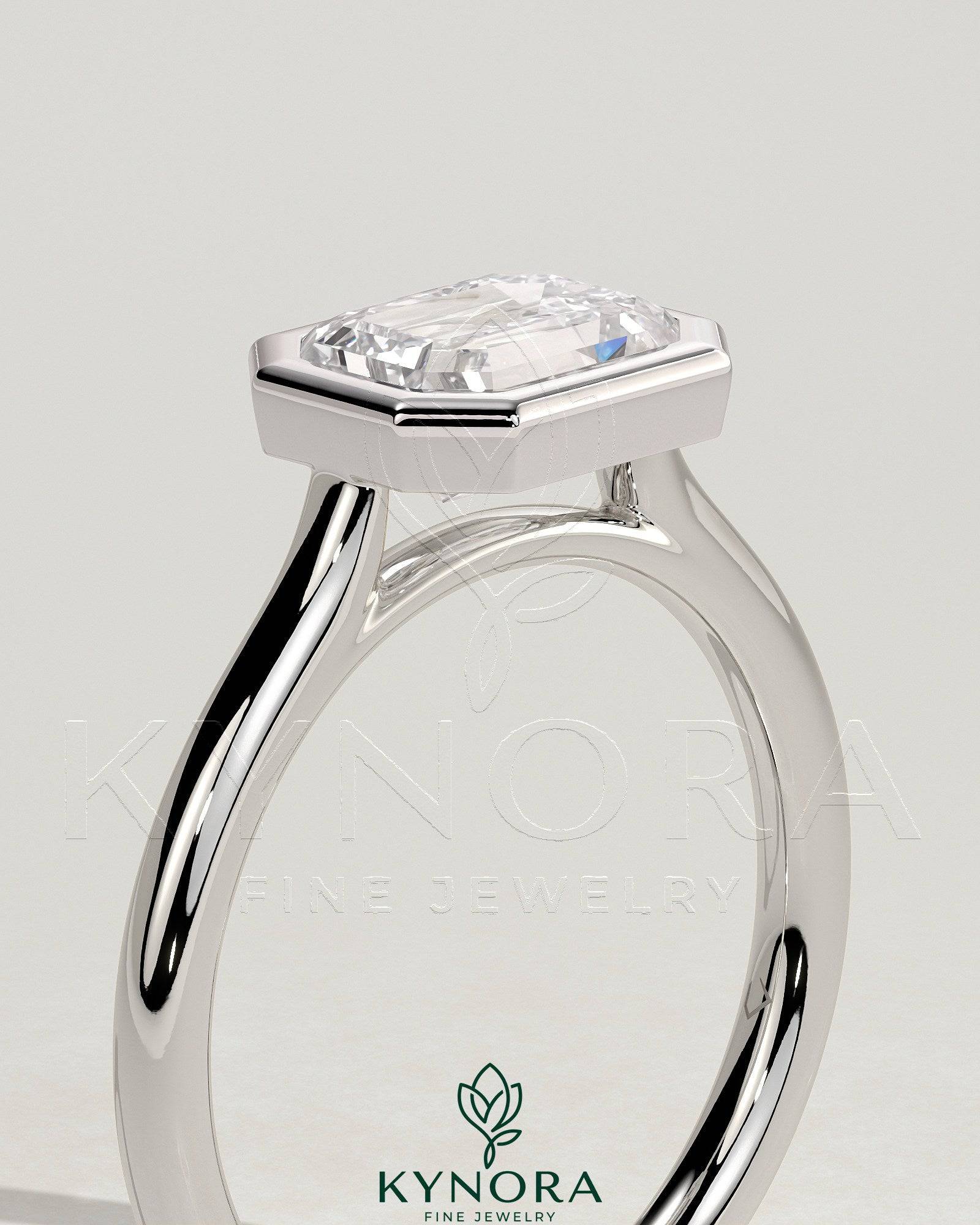 Statement 2ct Emerald East West Bezel Solitaire with Open Cathedral High Setting Engagement Ring Secondary image