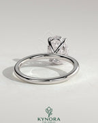 Kynora CJ Classic 2ct oval claw solitaire engagement ring with a prominent diamond set in a sleek silver band.