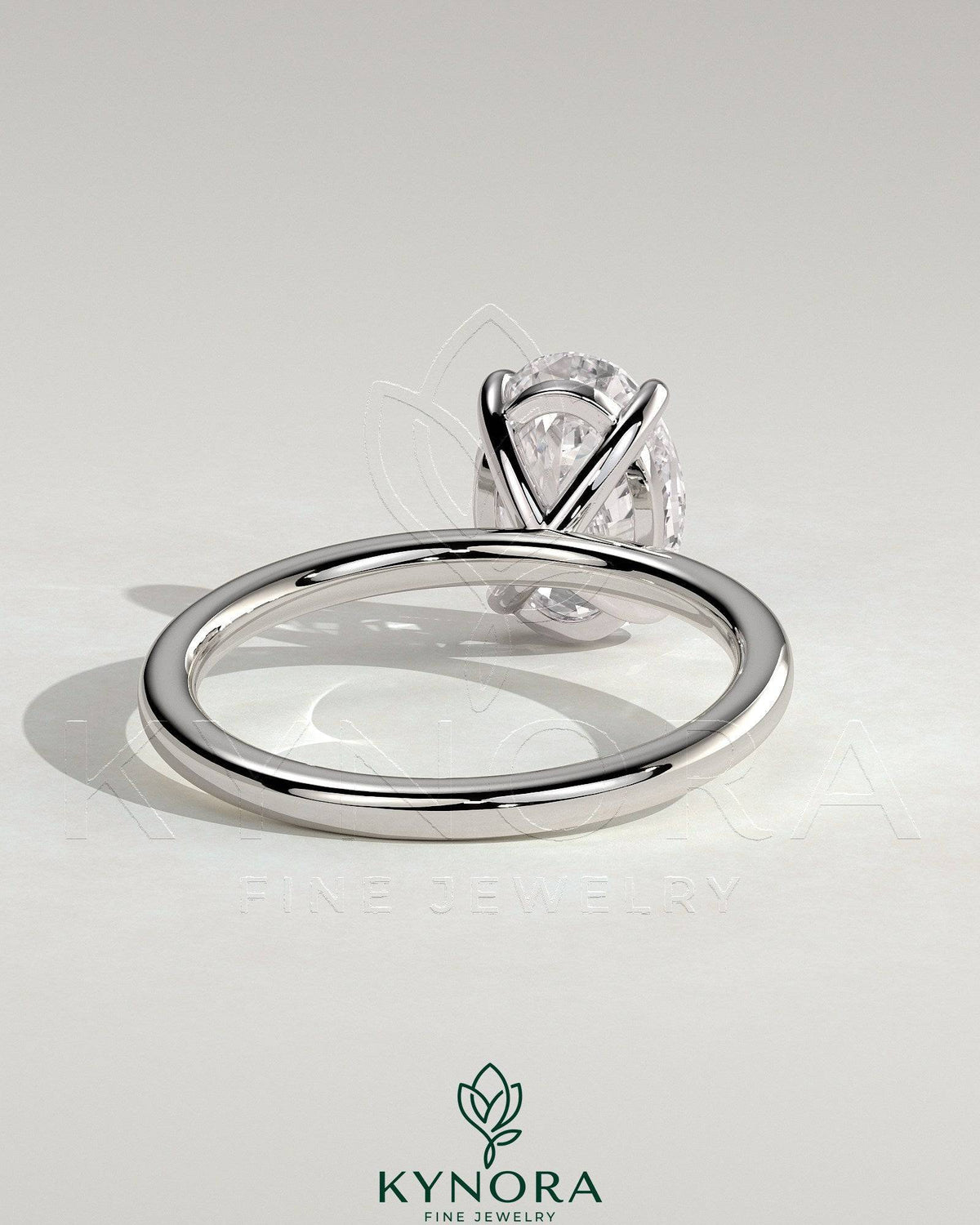 Kynora CJ Classic 2ct oval claw solitaire engagement ring with a prominent diamond set in a sleek silver band.