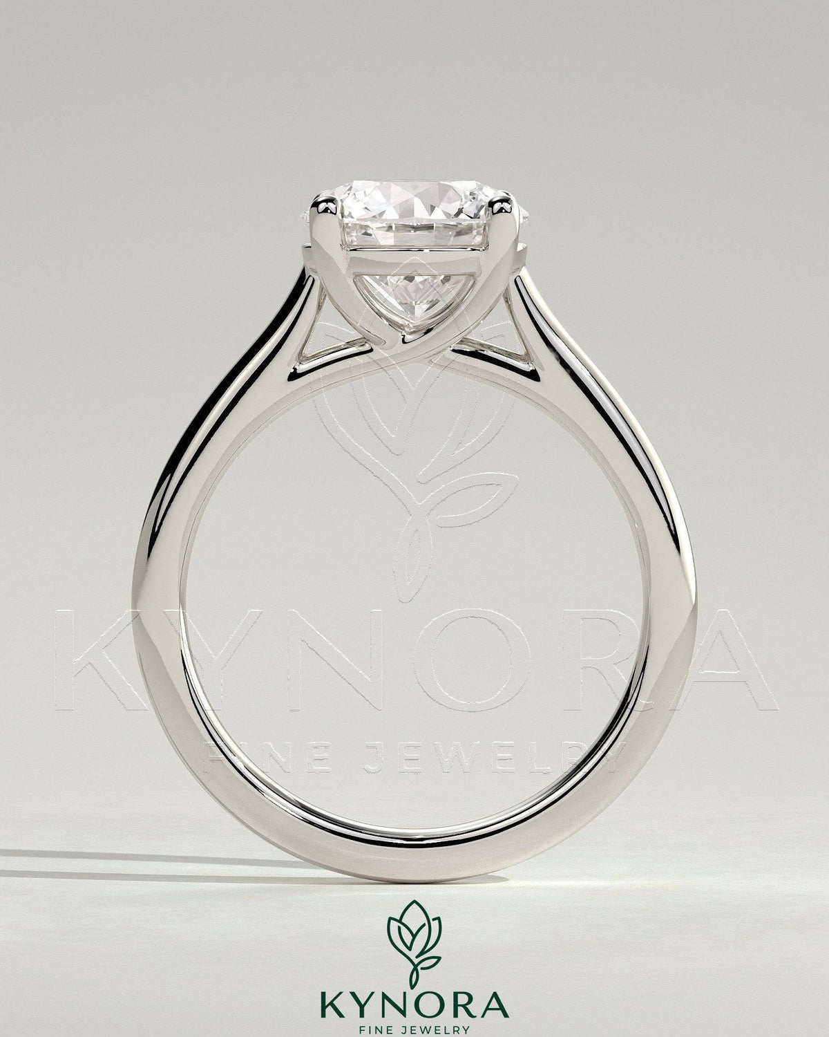 Kynora CJ 2ct round diamond solitaire engagement ring with trellis gallery and cathedral low setting, showcasing elegant craftsmanship.