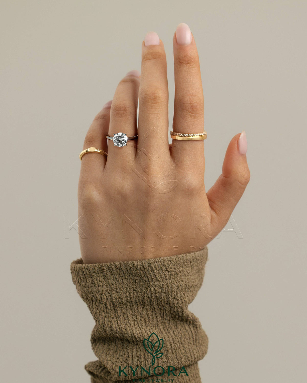 Kynora CJ 2ct round diamond solitaire engagement ring with trellis gallery and cathedral low setting, showcasing elegant jewelry craftsmanship.