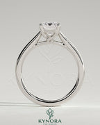 Kynora CJ 2ct emerald claw solitaire engagement ring with spiral gallery and cathedral low setting, showcasing fine diamond detail.