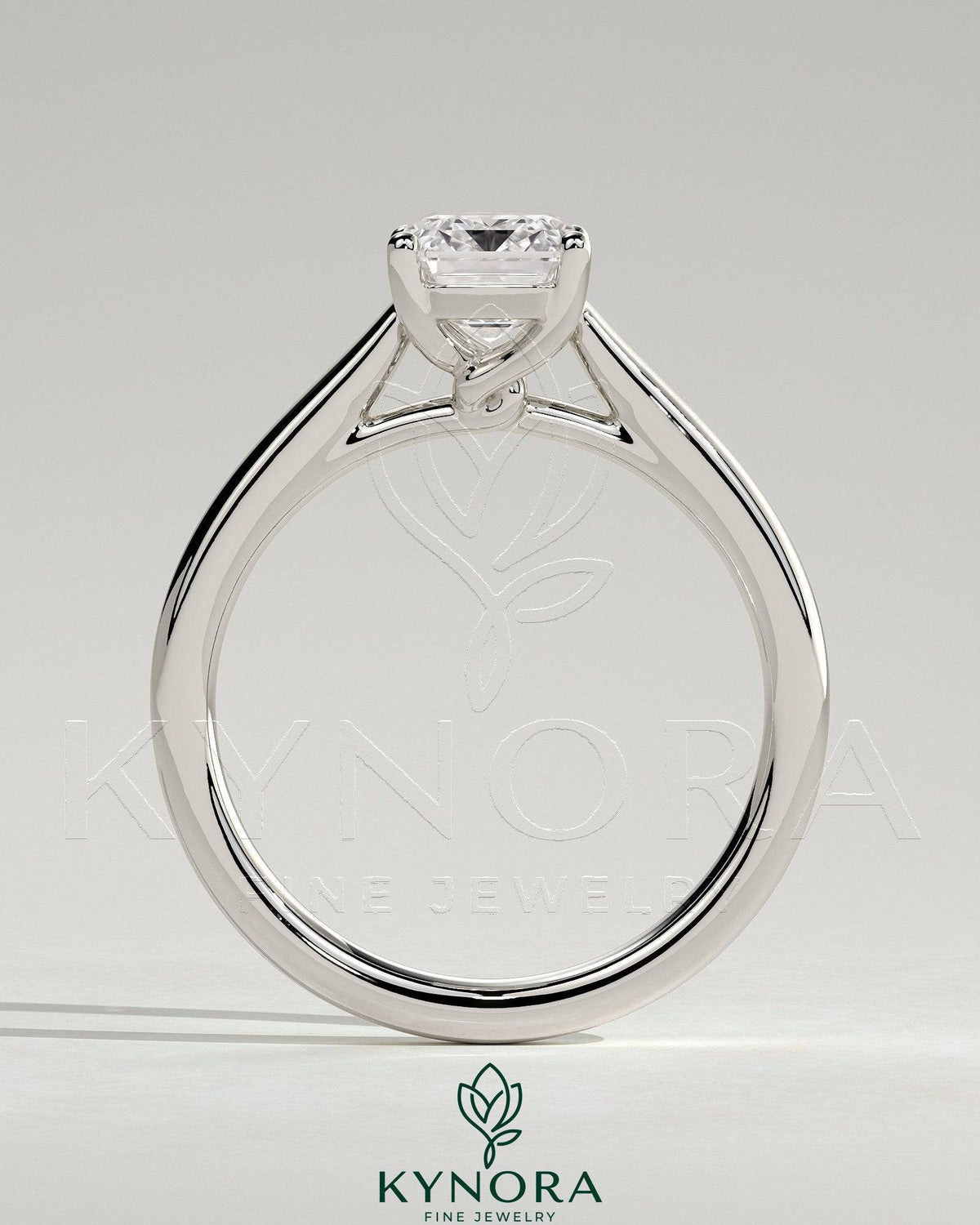 Kynora CJ 2ct emerald claw solitaire engagement ring with spiral gallery and cathedral low setting, showcasing fine diamond detail.