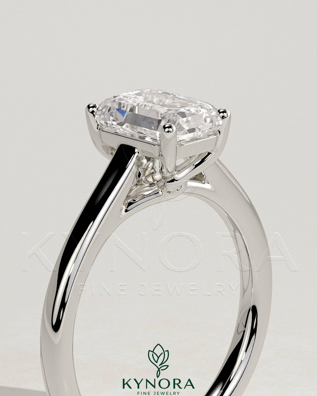 Kynora CJ 2ct emerald claw solitaire engagement ring with spiral gallery and cathedral low setting, elegant and detailed design