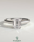 Kynora CJ 2ct emerald claw solitaire engagement ring with spiral gallery and cathedral low setting, showcasing elegant craftsmanship.