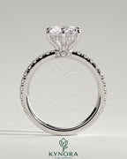 Kynora CJ 2ct round claw solitaire engagement ring with hidden halo, pave collar and band, featuring sparkling diamond details.
