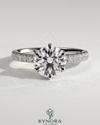 Kynora CJ 2ct round solitaire engagement ring with hidden halo, pave collar and pave band, elegant diamond jewelry