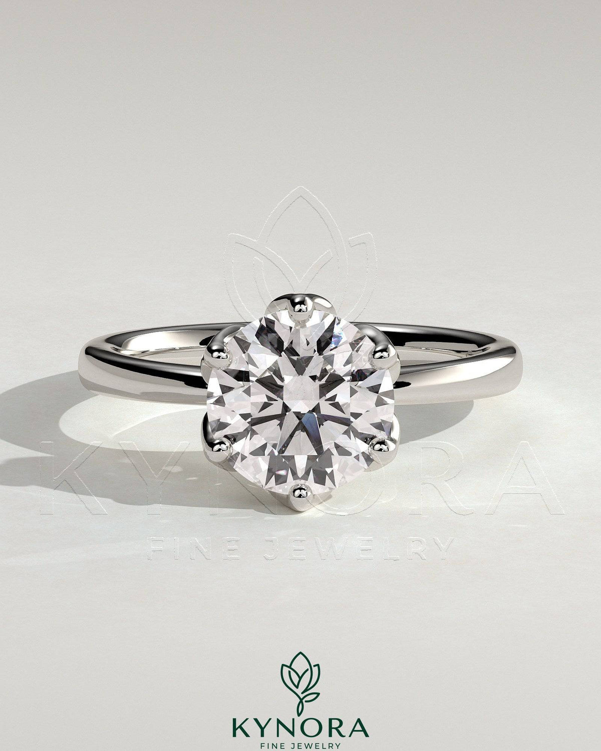 Kynora CJ 2ct round claw solitaire engagement ring with petal gallery and tapered band, showcasing elegant jewelry craftsmanship.