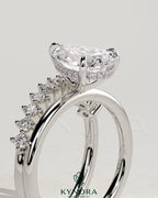 Kynora CJ 2ct pear-shaped diamond solitaire engagement ring with double plain and round accent stones band, elegant jewelry design