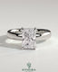Kynora CJ 2ct radiant diamond claw solitaire engagement ring with cigar band and hidden halo, elegant and sparkling jewelry piece.
