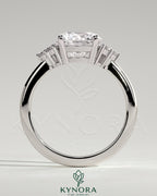 Kynora CJ 2ct round claw solitaire engagement ring with round shoulder stones, showcasing a sparkling center diamond and elegant design.