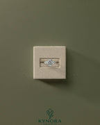 Kynora CJ 2ct oval claw trilogy engagement ring with pear side stones and open trellis gallery design in sterling silver