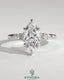 Kynora CJ three-stone engagement ring with 2ct marquise claw solitaire, pear accents, and round shoulder stones.