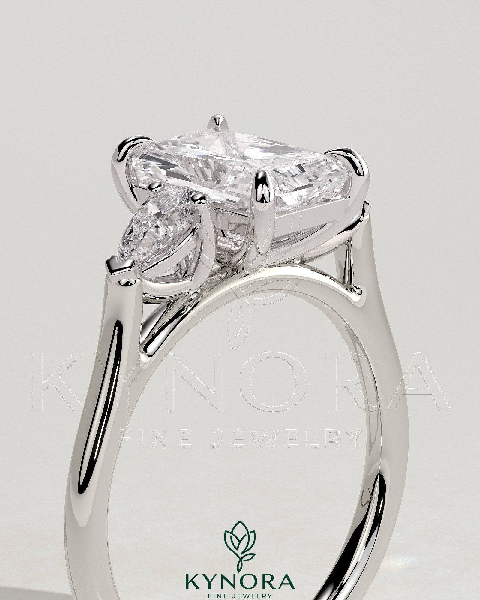 2ct Radiant Claw Trilogy with Pear Side Stones and Cathedral Setting Engagement Ring Imagen secundaria del producto