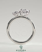 Kynora CJ 0.5ct pear-shaped diamond and 1.25ct pear-shaped diamond Toi et Moi engagement ring with claw settings.