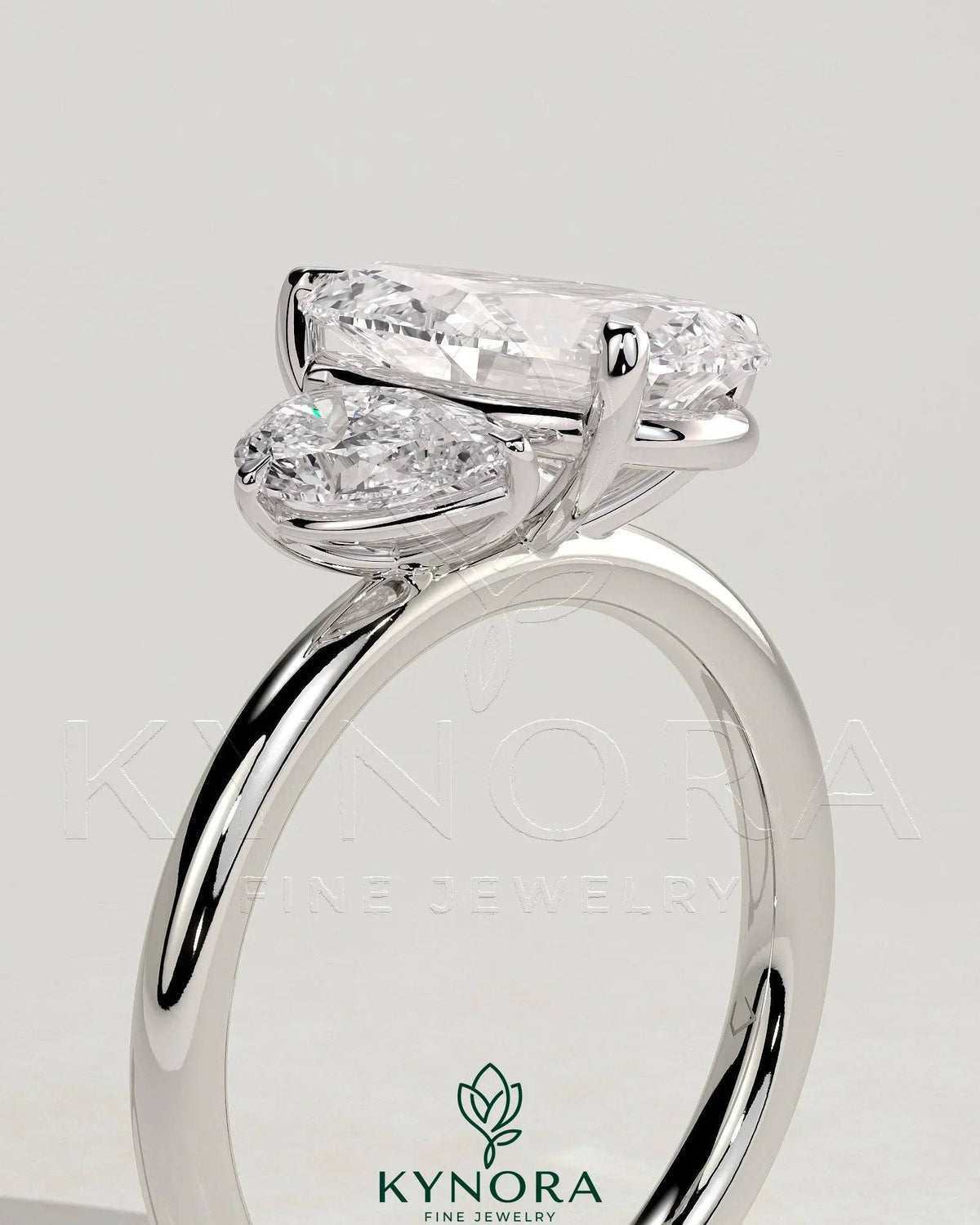 Kynora CJ 0.5ct and 1.25ct pear-shaped Toi et Moi engagement ring with claw setting, elegant and sparkling jewelry design
