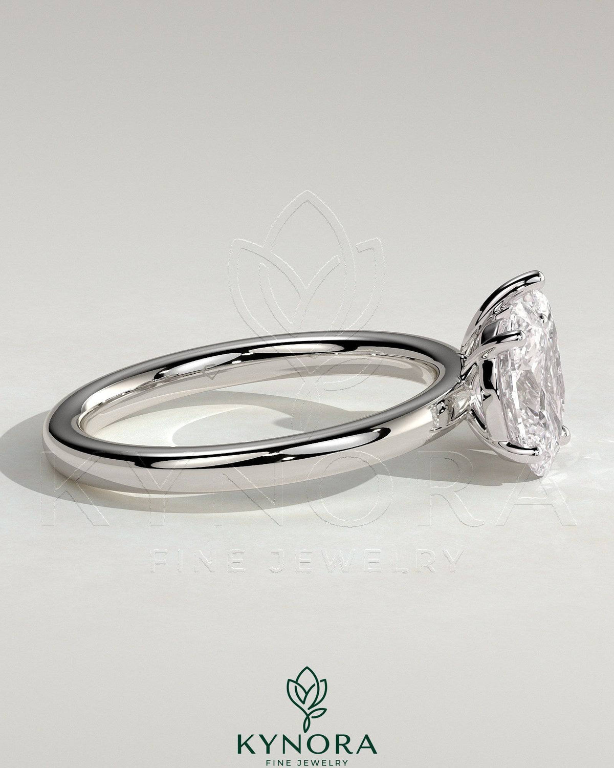 Kynora CJ Toi et Moi engagement ring featuring a 1.5ct pear-shaped and 1.5ct oval-shaped diamonds in a claw setting.