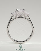 Kynora CJ classic 2-carat radiant cut three-stone engagement ring with claw setting, showcasing elegant sparkle and craftsmanship.