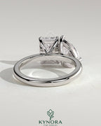 Kynora CJ Toi et Moi engagement ring with 1.5ct pear-shaped and 1.8ct radiant diamonds in a claw setting.