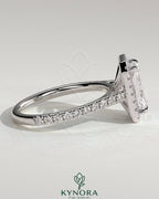 Kynora CJ 2ct radiant claw solitaire halo engagement ring with pave band and cathedral high setting, showcasing sparkling diamond details