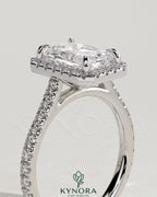 Kynora CJ 2-carat radiant claw solitaire halo engagement ring with pave band and cathedral high setting, elegant diamond jewelry