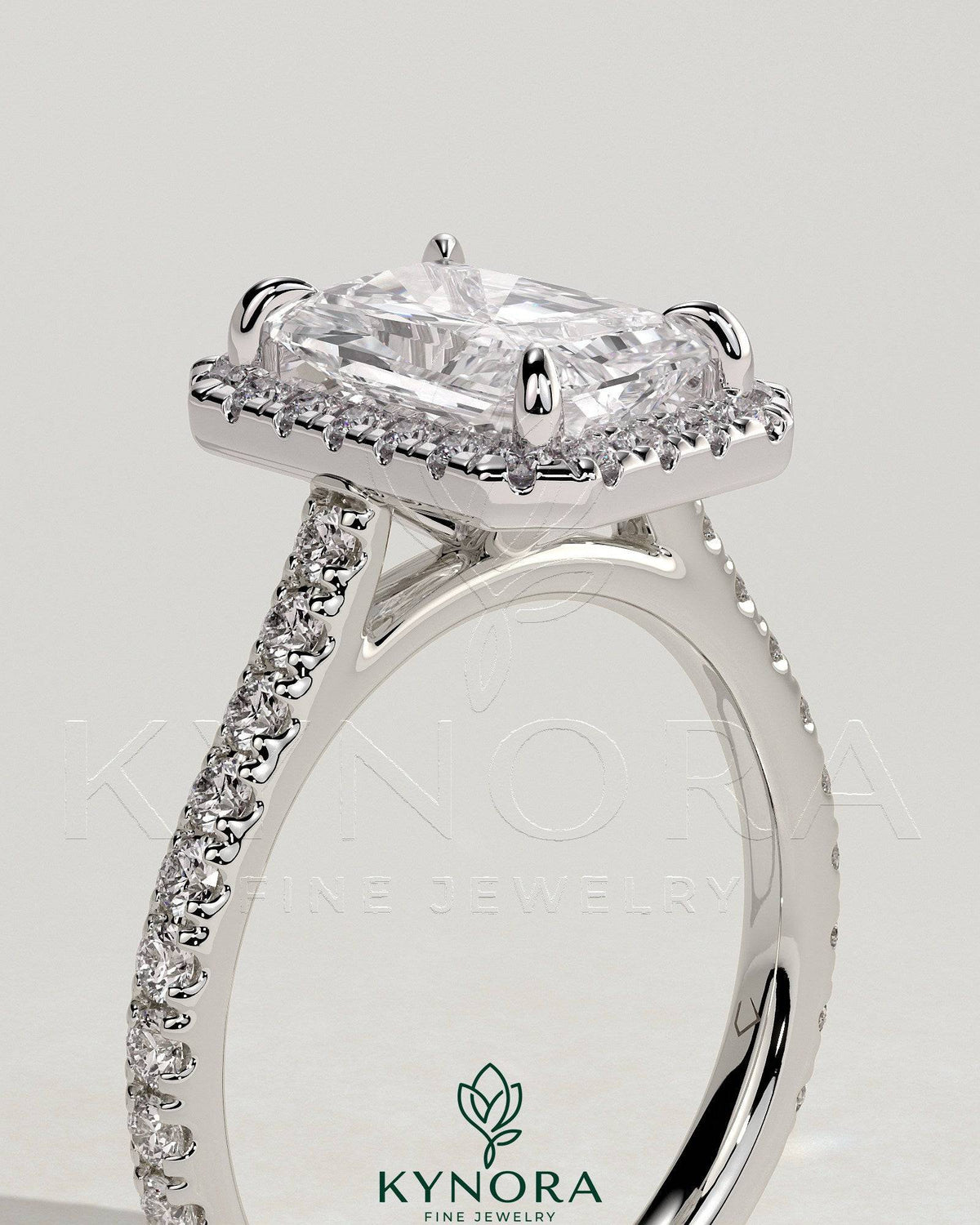 Kynora CJ 2-carat radiant claw solitaire halo engagement ring with pave band and cathedral high setting, elegant diamond jewelry