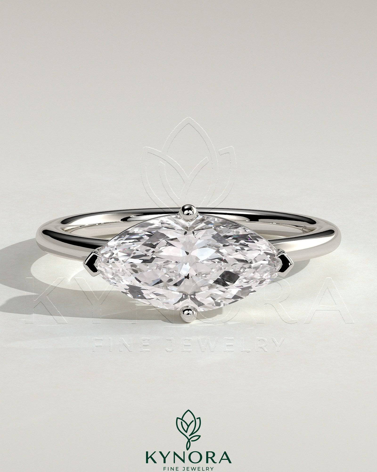 Kynora CJ 2ct marquise east-west claw solitaire engagement ring with raised basket gallery and intricate metalwork. Main image